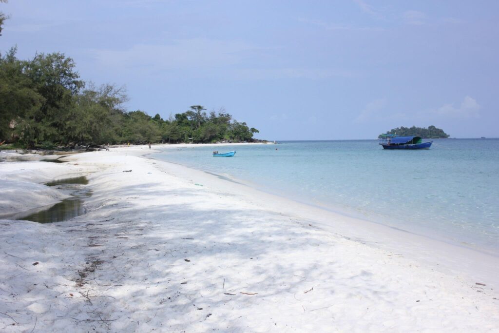 Wide white-sand beach and turquoise water on Koh Rong, Cambodia